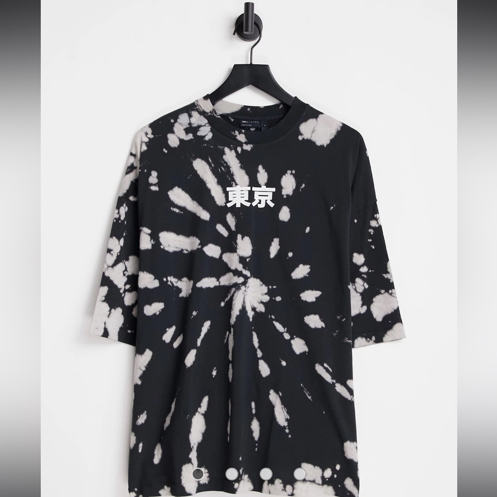 Oversized t-shirt in cream & black bleach wash tie dye with chest print